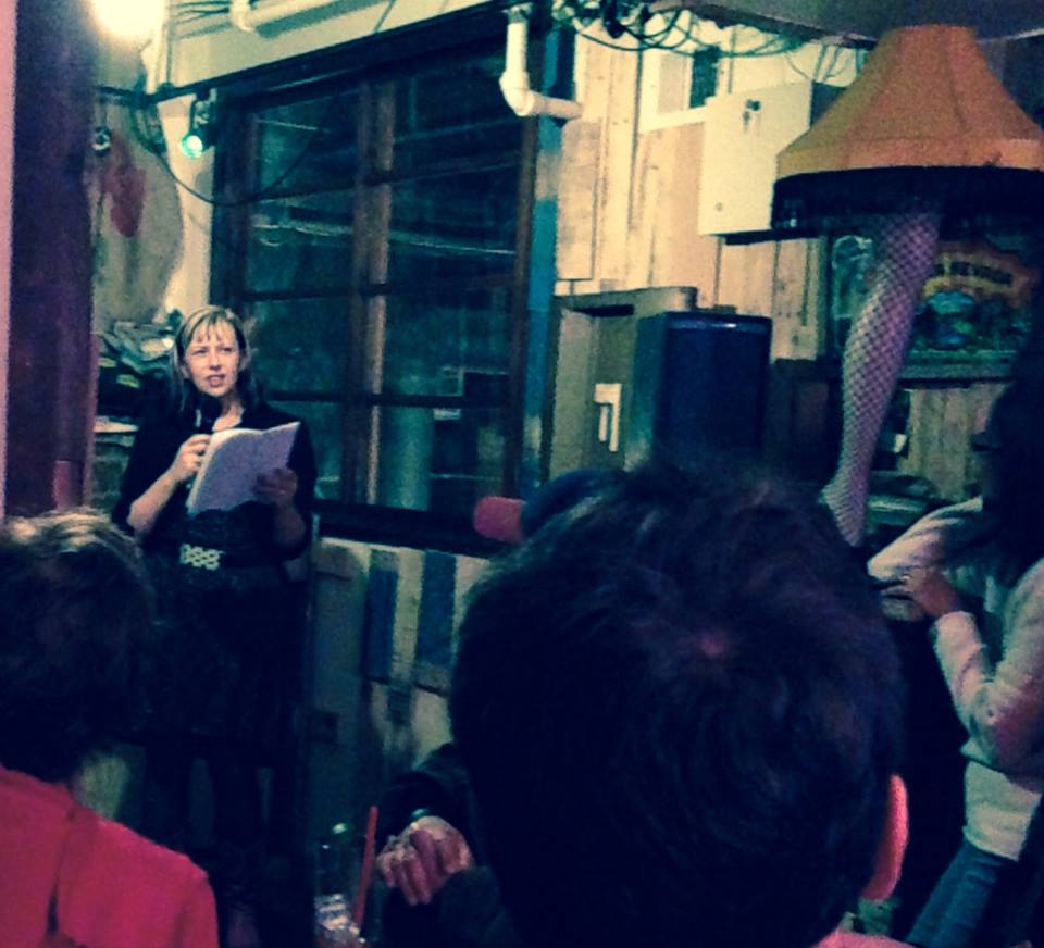 Me reading at Seattle Lit Crawl. Photo by Jenny Forrester